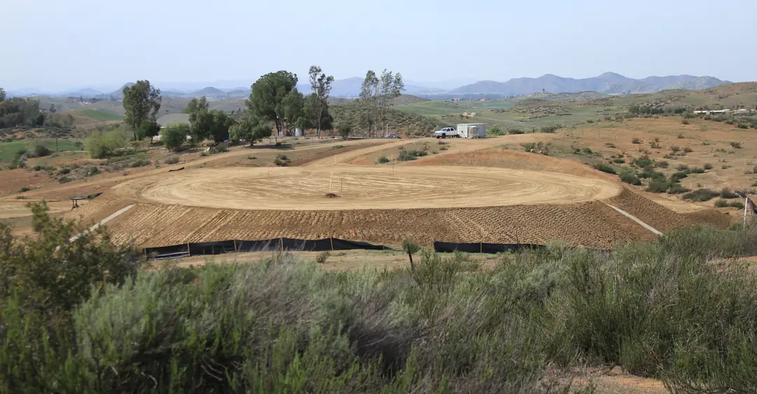 Finished graded pad in rolling hills